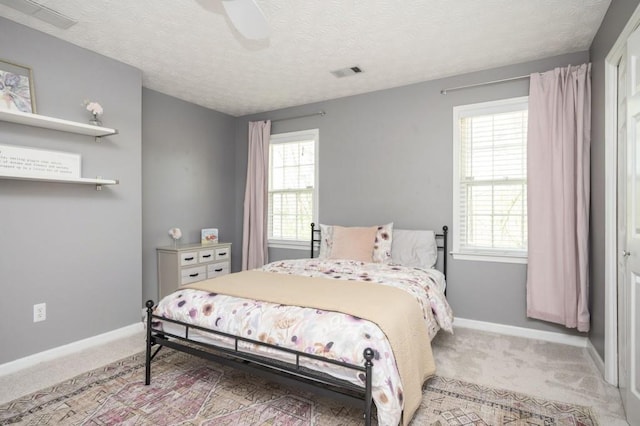 2689 Spring Rock Ct NE, Roswell, GA 30075 - bedroom with carpet floors, a ceiling fan, and a textured ceiling