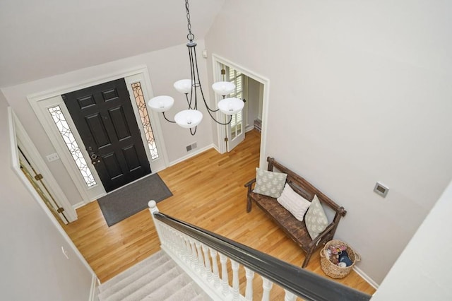 2689 Spring Rock Ct NE, Roswell, GA 30075 - entryway with wood finished floors and vaulted ceiling