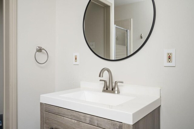 2689 Spring Rock Ct NE, Roswell, GA 30075 - bathroom featuring vanity and an enclosed shower
