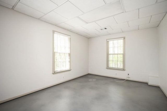 2689 Spring Rock Ct NE, Roswell, GA 30075 - spare room featuring concrete floors and baseboards