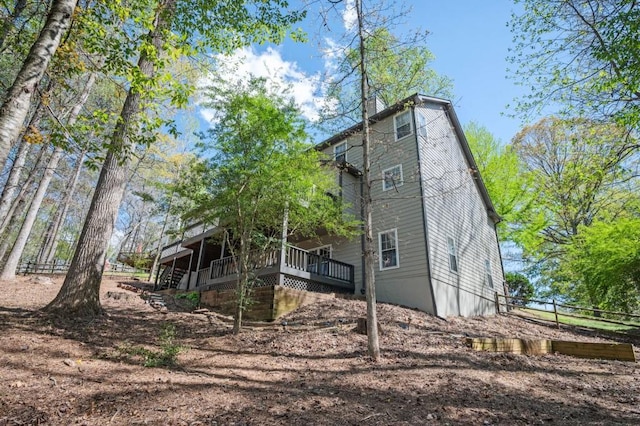 2689 Spring Rock Ct NE, Roswell, GA 30075 - rear view of house with a deck and stairs