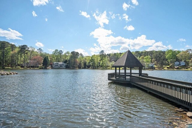 2689 Spring Rock Ct NE, Roswell, GA 30075 - dock area featuring a gazebo, a water view, and view of wooded area
