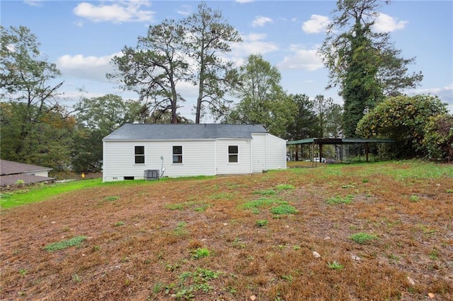 329 Cranfill Rd SE, Marietta, GA 30060 - rear view of property featuring a carport and central AC unit