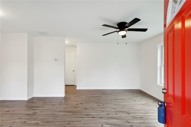 329 Cranfill Rd SE, Marietta, GA 30060 - foyer featuring wood finished floors, ceiling fan, and baseboards