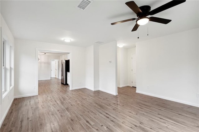 329 Cranfill Rd SE, Marietta, GA 30060 - unfurnished room featuring light wood finished floors, baseboards, and ceiling fan