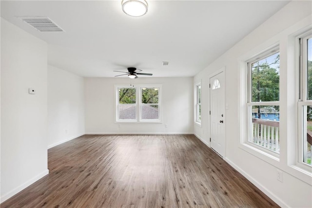 329 Cranfill Rd SE, Marietta, GA 30060 - foyer entrance featuring wood finished floors, ceiling fan, and baseboards