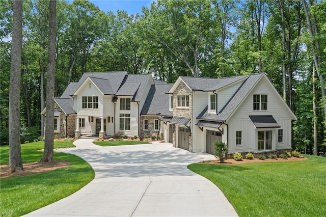 384 Hickory Pass, Alpharetta, GA 30004 - modern farmhouse featuring board and batten siding, concrete driveway, an attached garage, roof with shingles, and stone siding