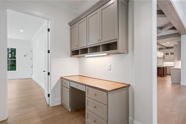 384 Hickory Pass, Alpharetta, GA 30004 - unfurnished office with light wood-type flooring, recessed lighting, baseboards, built in desk, and beamed ceiling