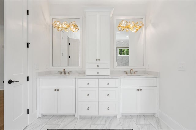384 Hickory Pass, Alpharetta, GA 30004 - bathroom with double vanity and baseboards