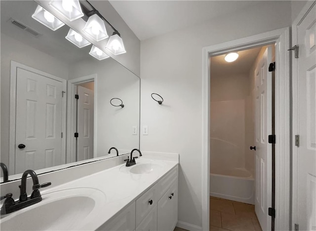 bathroom featuring vanity and tile patterned floors