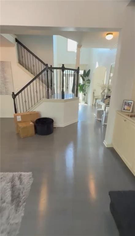 living area featuring stairs