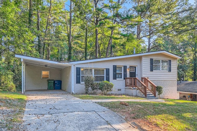 view of front of home featuring a carport