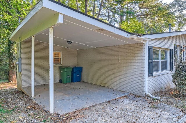 exterior space featuring a carport