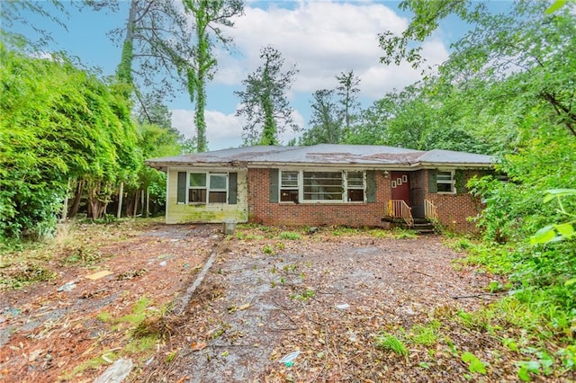 view of front of property with brick siding