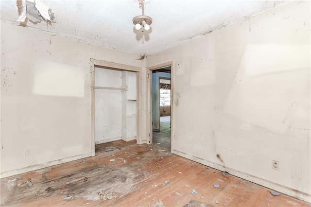 empty room featuring wood finished floors