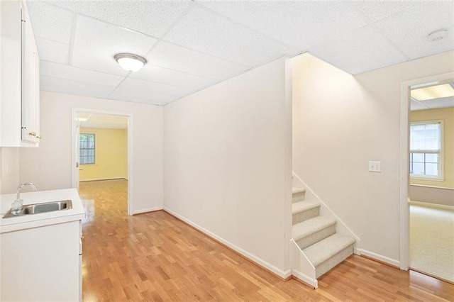 4770 Powers Park Ct NE, Marietta, GA 30067 - interior space with a paneled ceiling, wood finished floors, healthy amount of natural light, and baseboards