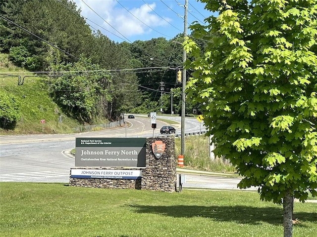 4770 Powers Park Ct NE, Marietta, GA 30067 - view of community featuring a lawn