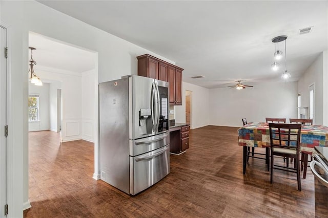 4515 Ambassador Way, Cumming, GA 30040 - kitchen with stainless steel fridge with ice dispenser, ceiling fan, dark wood-style flooring, pendant lighting, and dark countertops