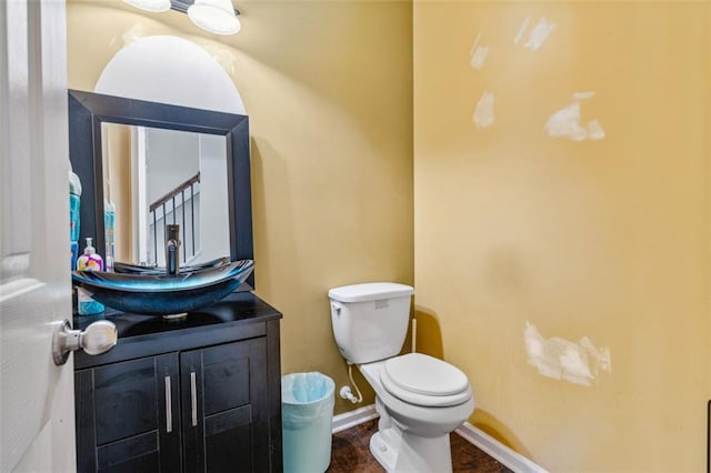 4515 Ambassador Way, Cumming, GA 30040 - half bathroom with toilet, baseboards, and vanity