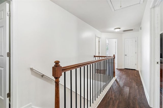 4515 Ambassador Way, Cumming, GA 30040 - hallway with an upstairs landing, attic access, wood finished floors, and baseboards