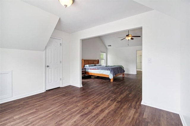 4515 Ambassador Way, Cumming, GA 30040 - bedroom with vaulted ceiling, wood finished floors, and baseboards