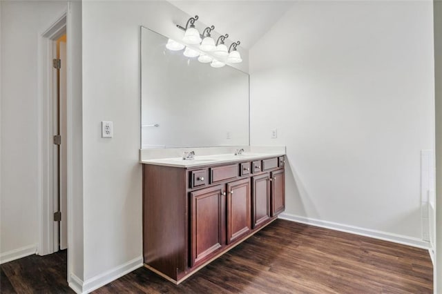 4515 Ambassador Way, Cumming, GA 30040 - full bathroom featuring wood finished floors, double vanity, baseboards, and lofted ceiling