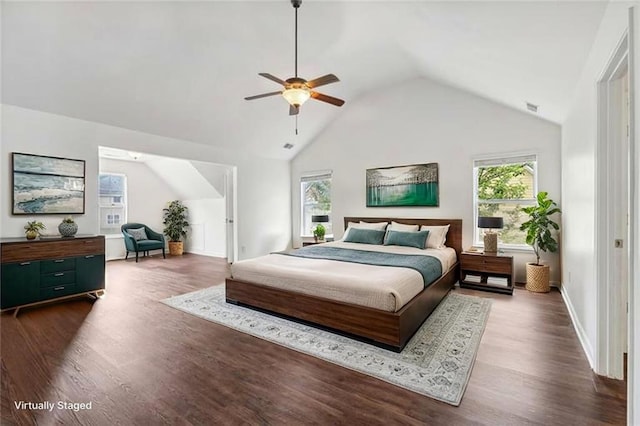 4515 Ambassador Way, Cumming, GA 30040 - bedroom featuring multiple windows, wood finished floors, lofted ceiling, baseboards, and a ceiling fan