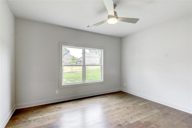3065 Reserve Ct SW, Conyers, GA 30094 - unfurnished room featuring wood finished floors, baseboards, and ceiling fan