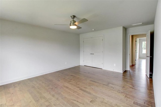 3065 Reserve Ct SW, Conyers, GA 30094 - unfurnished room with ceiling fan, light wood-style flooring, and baseboards