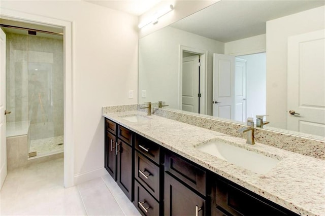 3065 Reserve Ct SW, Conyers, GA 30094 - full bathroom featuring double vanity, a shower stall, tile patterned flooring, and baseboards