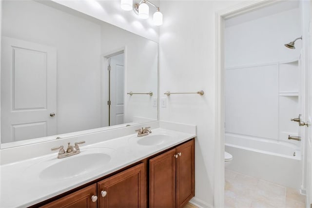 full bathroom with toilet, shower / bathing tub combination, tile patterned flooring, and vanity