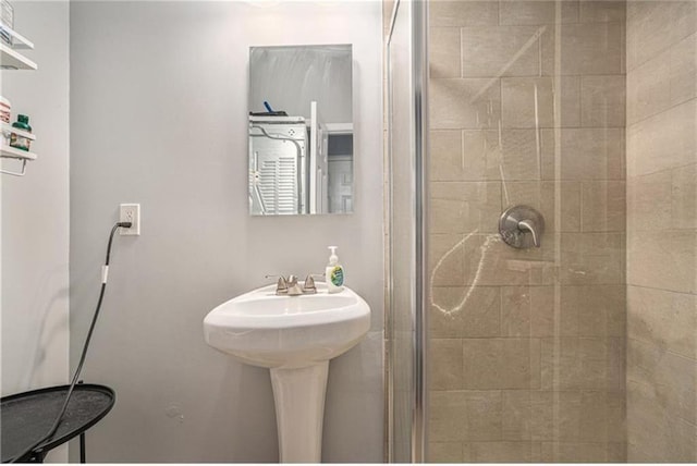 full bathroom featuring a stall shower