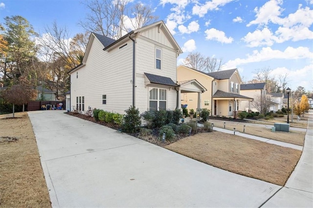 view of front of home featuring a residential view and board and batten siding