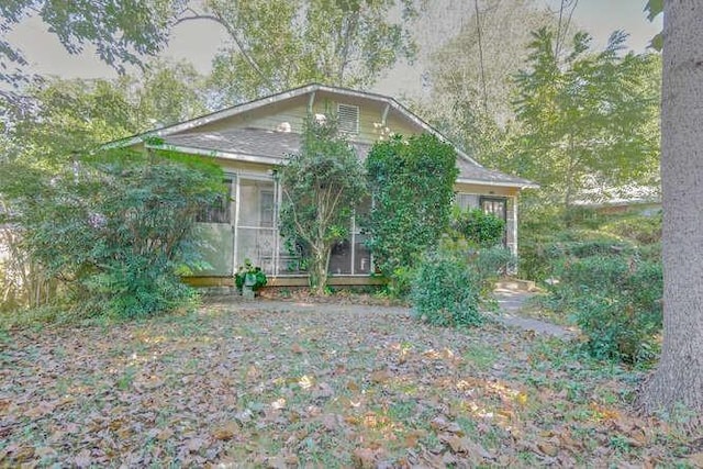 exterior space with a sunroom