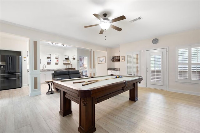 rec room with light wood finished floors, visible vents, pool table, and a ceiling fan