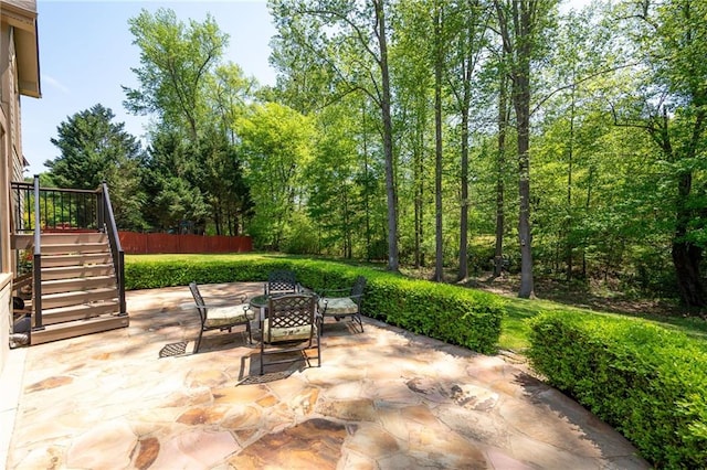 view of patio with stairway