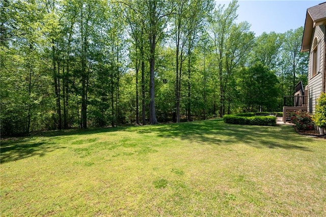 view of yard featuring a deck