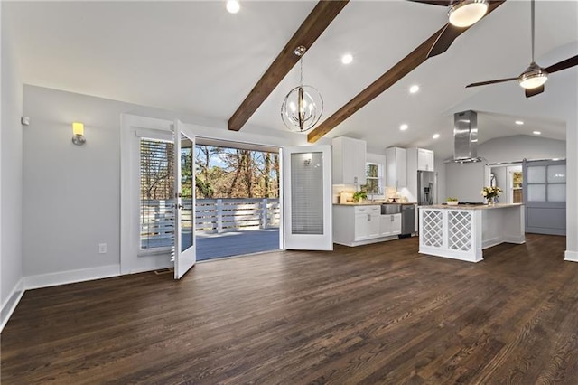 4178 Castle Pines Ct, Tucker, GA 30084 - unfurnished living room with dark wood-style flooring, recessed lighting, baseboards, ceiling fan, and a chandelier