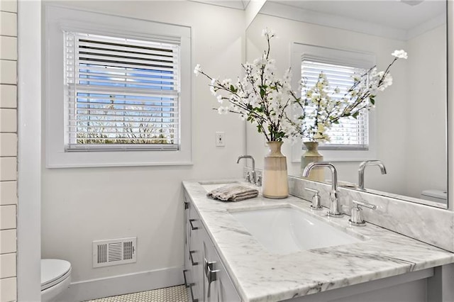 4178 Castle Pines Ct, Tucker, GA 30084 - bathroom with toilet, double vanity, and baseboards