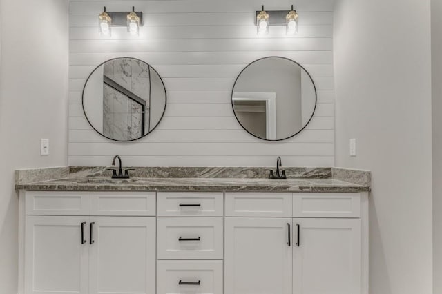 961 Goat Rd NW, Resaca, GA 30735 - full bathroom with double vanity, wooden walls, and a shower
