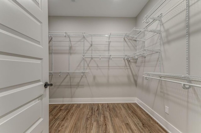 961 Goat Rd NW, Resaca, GA 30735 - walk in closet featuring wood finished floors
