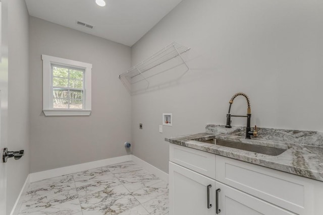 961 Goat Rd NW, Resaca, GA 30735 - washroom with electric dryer hookup, light marble finish flooring, baseboards, cabinet space, and hookup for a washing machine