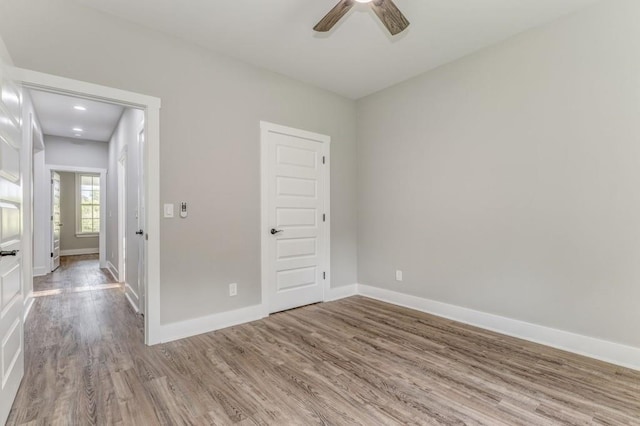 961 Goat Rd NW, Resaca, GA 30735 - empty room featuring wood finished floors, a ceiling fan, and baseboards