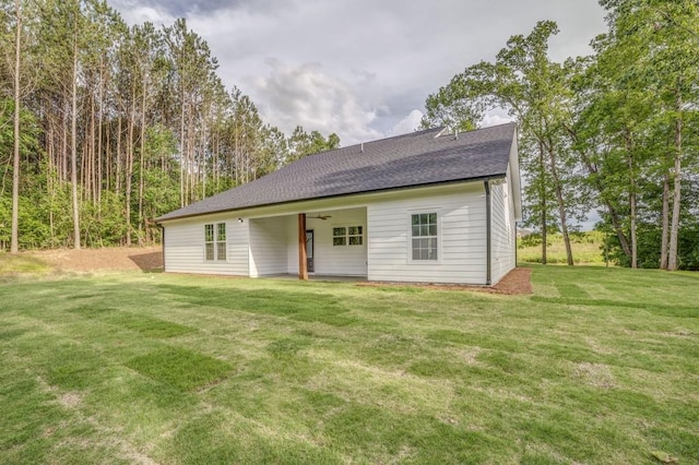 961 Goat Rd NW, Resaca, GA 30735 - back of house with a lawn, a shingled roof, and ceiling fan