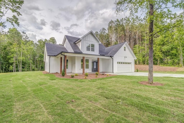 961 Goat Rd NW, Resaca, GA 30735 - modern inspired farmhouse featuring board and batten siding, driveway, a front yard, covered porch, and roof with shingles