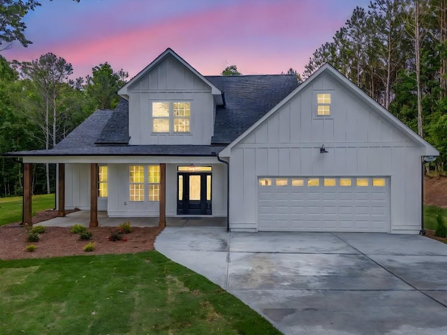 961 Goat Rd NW, Resaca, GA 30735 - modern inspired farmhouse featuring board and batten siding, a shingled roof, french doors, a garage, and covered porch