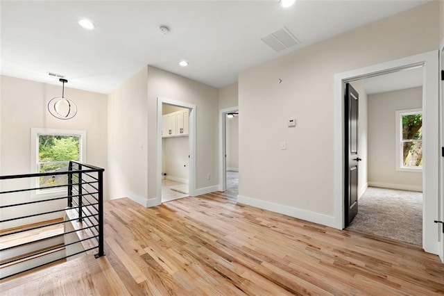 interior space with light hardwood / wood-style floors