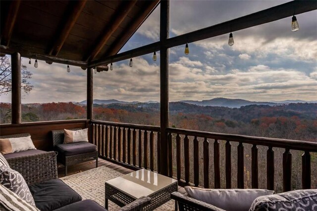 balcony featuring a mountain view