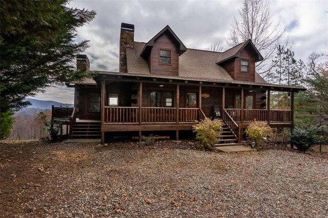 view of front of property featuring covered porch