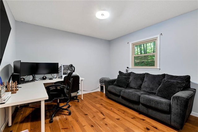 office space featuring light wood-style floors